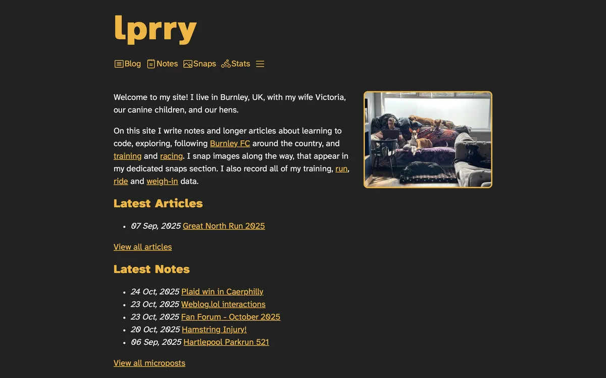 Screenshot of the homepage of this website in dark made, with black and orange colors reminiscent of the Burnley third strip in season 2025-6