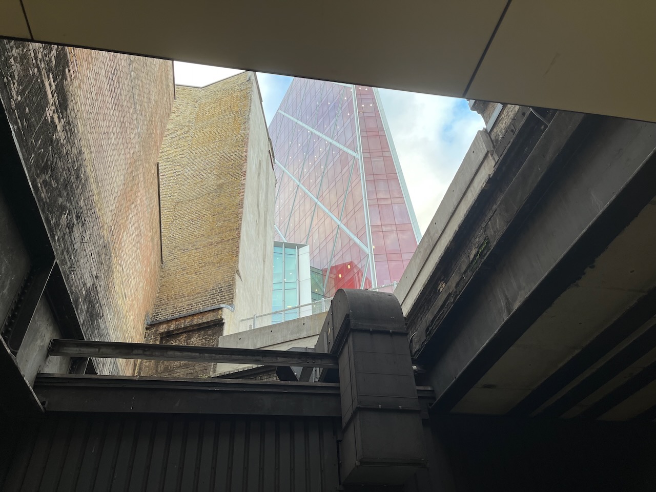 Looking out from the platform at Victori Station, up to the skyscrapers above.