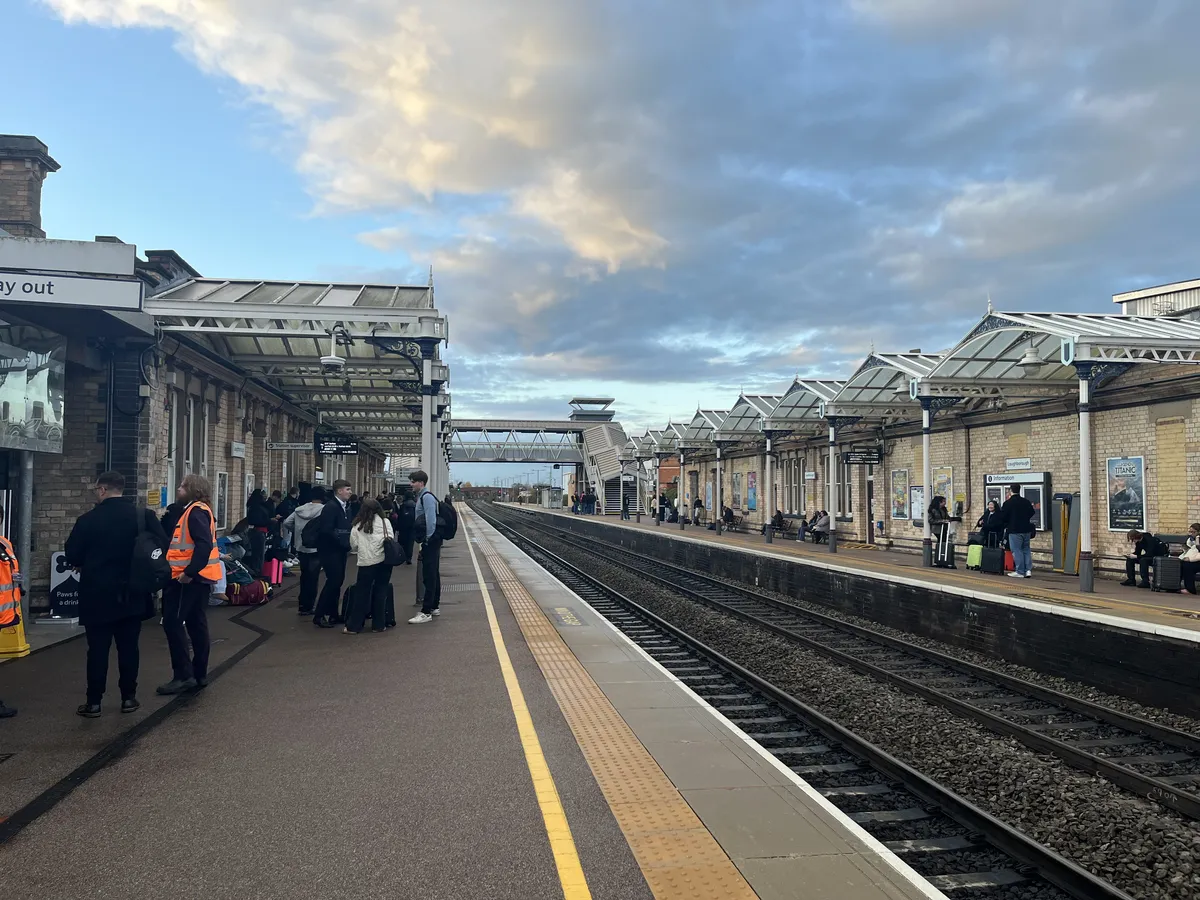 Looking along the platform at Loughborough tram station towards the footbridge.