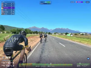 Riders avatars riding through green fields with blue skies and a mountain range beyond..