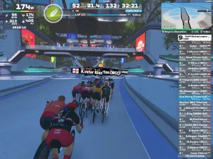 Riders avatars cycling in a colorful futuristic setting on Zwift